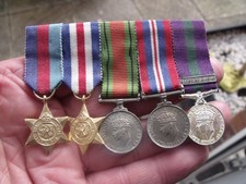 A PERIOD WW2 MINIATURE MEDAL