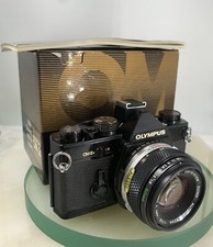Olympus black 35mm slr - olympus,
