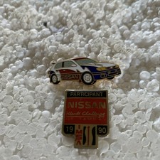 Job lot of 2 Nissan motor sport car related metal lapel pins