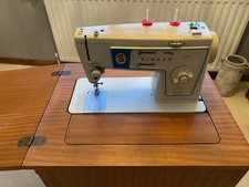 Vintage 60s SINGER Electric Sewing Machine in Hideaway Table with stool.