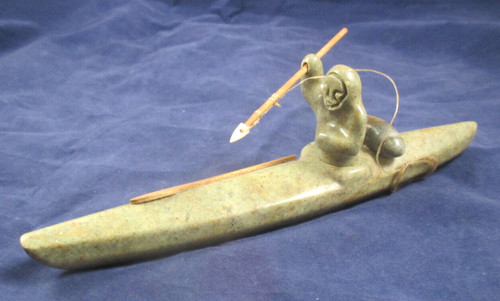 Carved soapstone eskimo - soapstone,