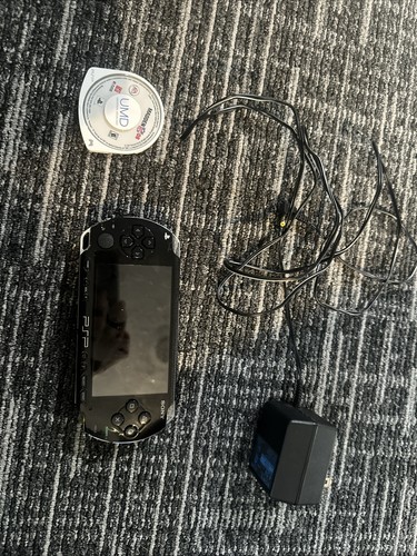 Used psp comes with - used, one