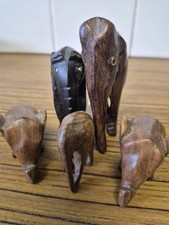 Five Wooden Elephants.