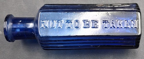 Antique blue ribbed poison