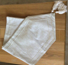 table runner with tassels and beading