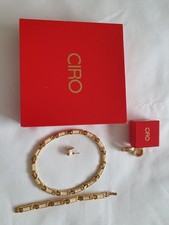 Ciro Goldtone and cream enamel
