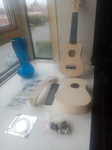 Ukulele small guitar - small,