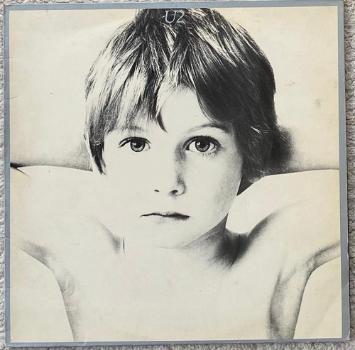 Boy - by, u2