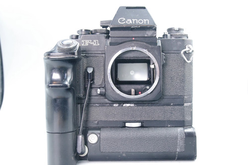 Canon 35mm slr - f‑1, +