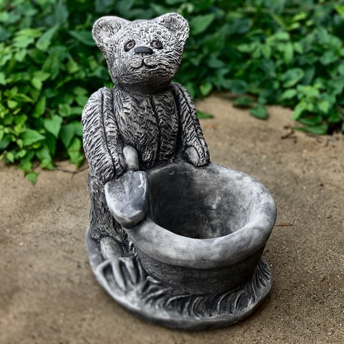 Teddy bear with - , pot