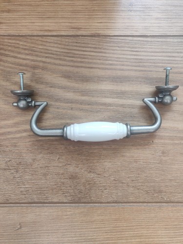 Cupboard door drop handle - door,