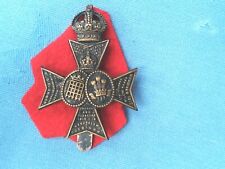 The 16th Battalion ( Queens Westminster Rifles ) County of London cap badge.