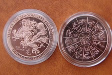 Golden State Mint 1oz .999 Fine Copper round, in capsule. Year of the dragon.