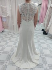 Size 14. Bridal dress by Dessy Collection. sample BNWT Was £699. Now £69