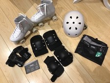 White Oxelo quad roller skates