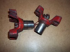 Classic Mini diff output flanges for rubber coupling type driveshafts.