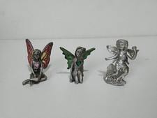 Pewter fairies, three small
