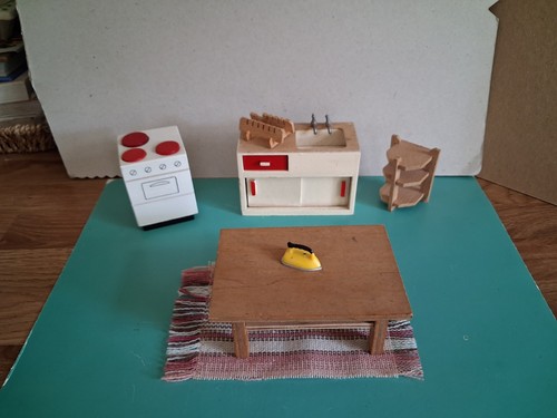 Vintage dolls house - dolls, kitchen