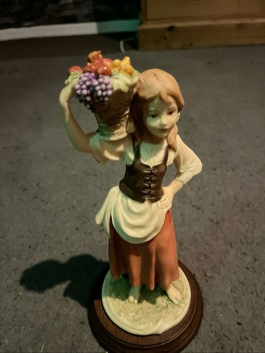Girl carrying fruit - carrying,