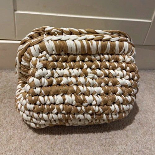 White and beige crochet clutch