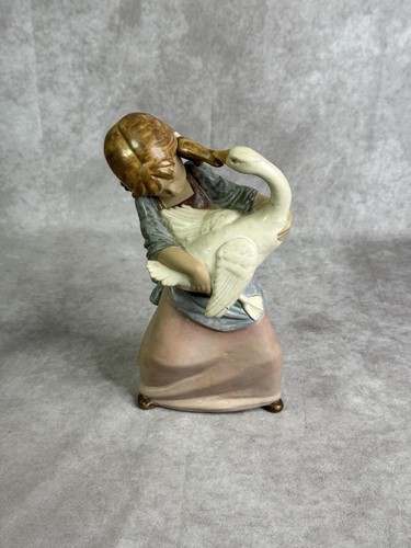 Lladro duck pulling pigtail - "duck,
