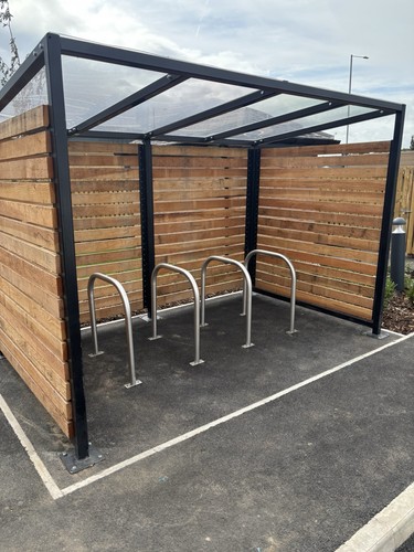 Cyclists shelter smoking - cyclists,