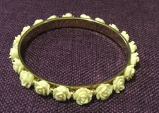 Gold tone metal bangle with - tone,