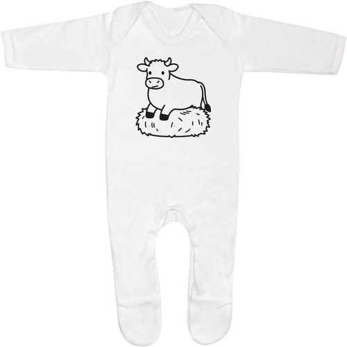 Cow sitting hay - on, baby