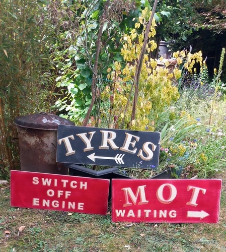 Rustic painted garage - rustic, tyres