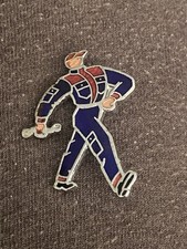 motoring advert quick fit badge mechanic exhaust tyres brakes spares 1970s auto