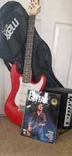 Red Strat electric guitar