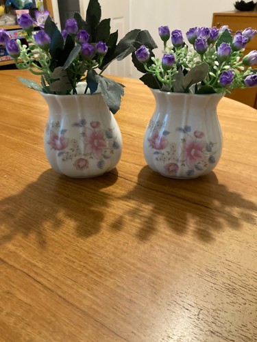 Small white vases with - white,