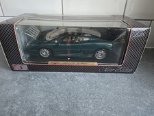 MAISTO JAGUAR XJ220 (1992) SILVER EDITION IN GREEN. BOXED.