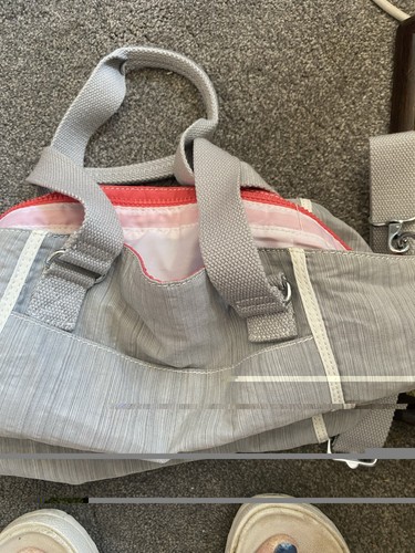 Kipling grey and orange - and,