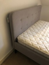 Attractive pale grey headboard double bed 