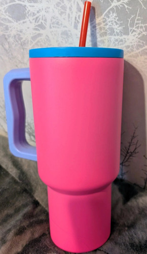 Pink plastic tumbler with - tumbler,