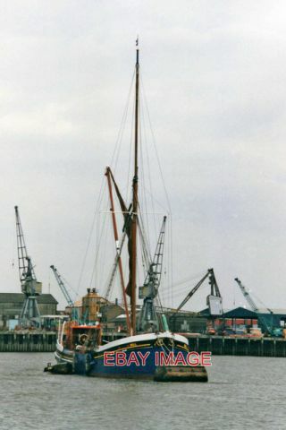 Photo thames barge leaving - ,