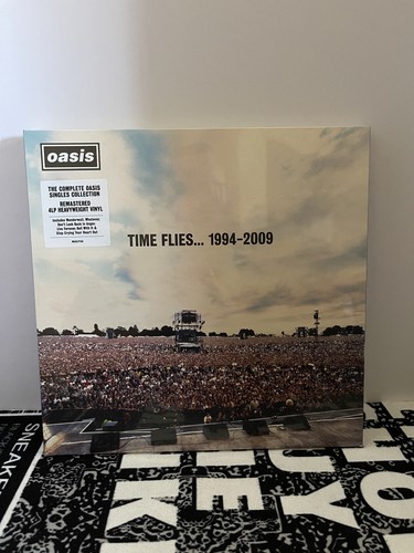 Oasis time flies - time,