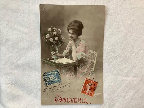 Souvenir lady a writing - at,