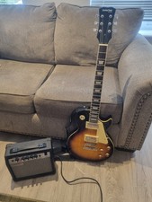 Stretton Payne electrical guitar with 10 Watt combo amplifier model No AIL 20  