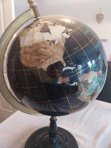 This geography globe - , features