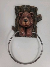 Rustic Bear in Tree Trunk