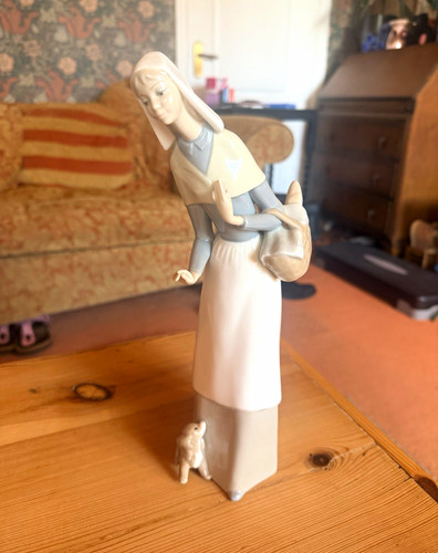 Lladro tall girl with bread