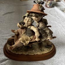 Vintage GIUSEPPE ARMANI CAPODIMONTE FIGURINE boy pushing girl on wheelbarrow 