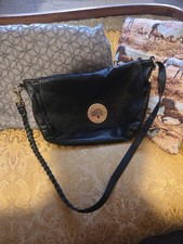 The item pictured is a black