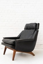 Black leather lounge chair by
