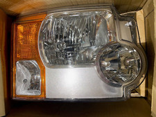 GENUINE FRONT RIGHT HEADLAMP