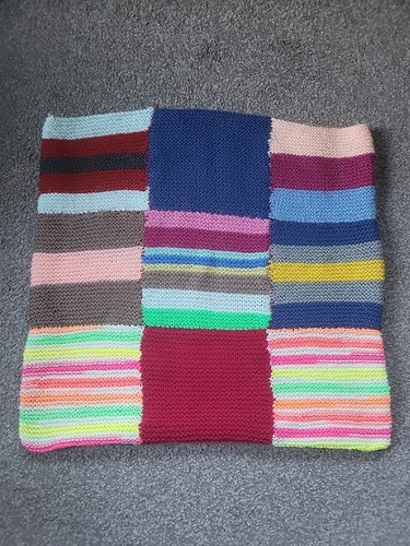 Hand knitted wool cushion - hand,