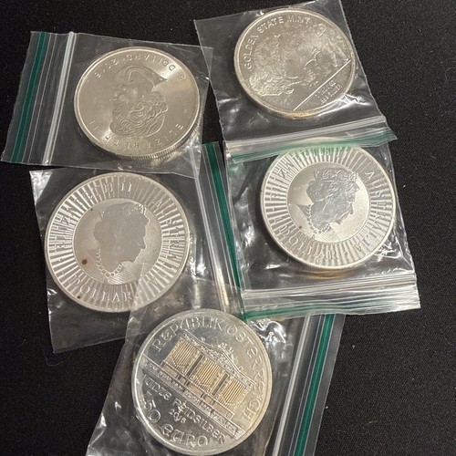 Silver coins assorted - x,