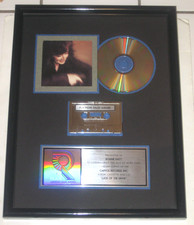 RIAA PLATINUM SALES AWARD PRESENTED TO BONNIE RAITT FOR LUCK OF THE DRAW